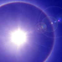 Pixwords The image with blue, halo, sun Woo Bing Siew - Dreamstime